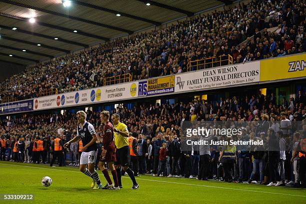 Millwall fans gather around the pitch during the Sky Bet League One Play Off: Second Leg between Millwall and Bradford City at The Den on May 20,...