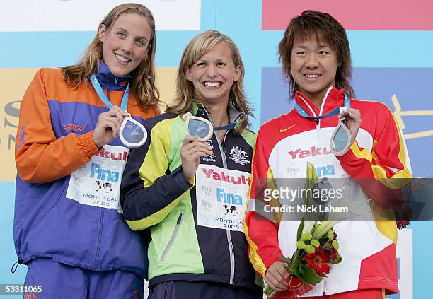 Marleen Veldhuis of the Netherlands wins the silver medal, Lisbeth Lenton of Australia wins the gold medal and Zhu Yingwen of China wins the bronze...