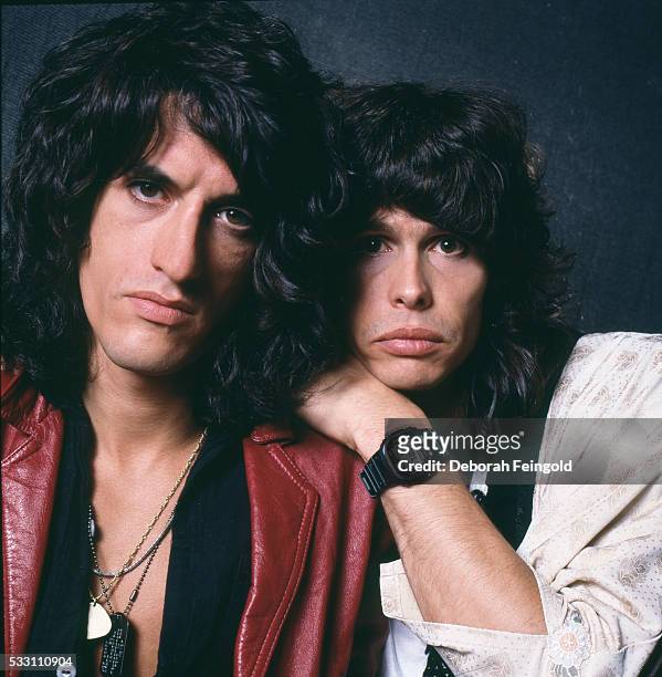 Deborah Feingold/Corbis via Getty Images) Aerosmith guitarist Joe Perry with singer Steven Tyler, Boston, Massachusetts, September 1985.