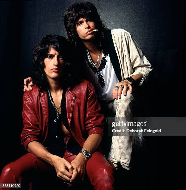 Deborah Feingold/Corbis via Getty Images) Aerosmith guitarist Joe Perry with singer Steven Tyler, Boston, Massachusetts, September 1985.