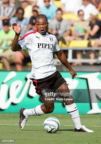 Collins John of Fulham FC looks to set up a play against the MLS All-Stars during the 2005 MLS All-Star game Crew Stadium on July 30, 2005 in...