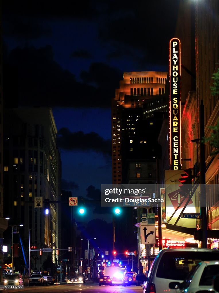 Night time street activity at Playhouse Square Theater District in downtown Cleveland, Ohio, USA