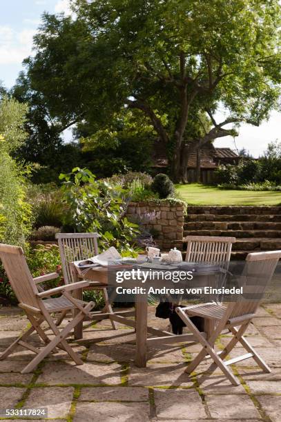 16th century sussex cottage known as 'the folly' - patio furniture stock pictures, royalty-free photos & images