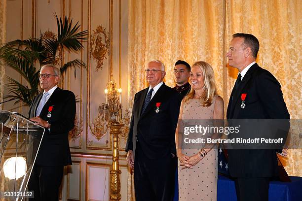 Autor Tom Brokaw, Doctor Gordon "Nick" Mueller, Ambassador of USA in France, Jane D. Hartley and Actor Tom Hanks attend the Flag Ceremony after Tom...