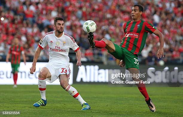 Maritimo's midfielder Fransergio with SL Benfica's defender from Brazil Jardel in action during the Taca CTT Final match between SL Benfica and CS...