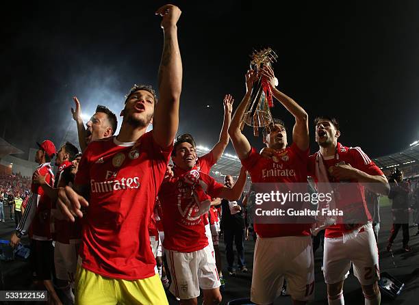 Benfica's forward from Brazil Jonas and teammates celebrate with trophy after winning the Portuguese League Cup Title at the end of the Taca CTT...