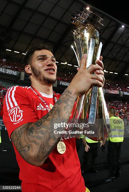 Benfica's goalkeeper from Brazil Ederson celebrates with trophy after winning the Portuguese League Cup Title at the end of the Taca CTT Final match...