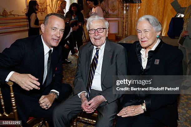 Actor Tom Hanks, Photographer John G. Morris and his wife attend the Flag Ceremony after Tom Hanks, Tom Brokaw & Gordon "Nick" Mueller received the...