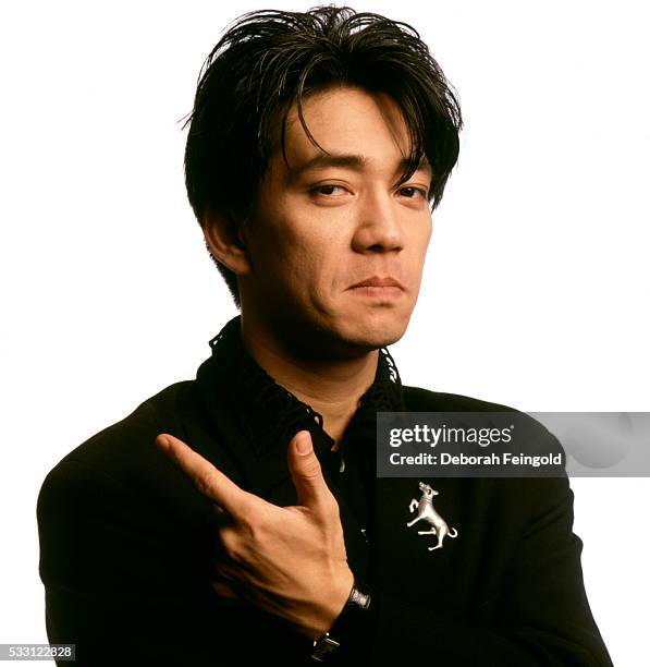 Deborah Feingold/Corbis via Getty Images) Japanese composer and actor Ryuichi Sakamoto poses for a portrait in 1988 in New York City, New York.