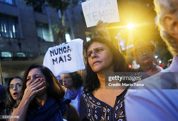 Protesters demonstrate against interim President Michel Temer on May 20, 2016 in Rio de Janeiro, Brazil. Temer assumed the position last week...