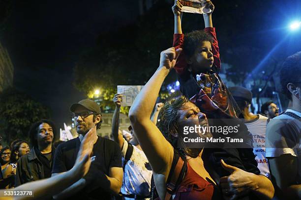 Protesters march against interim President Michel Temer on May 20, 2016 in Rio de Janeiro, Brazil. Temer assumed the position last week following the...