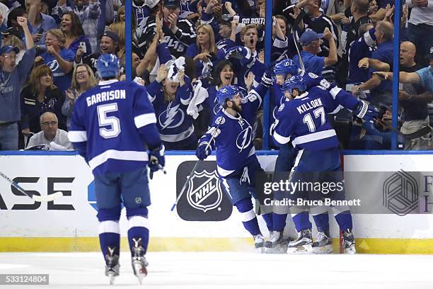 Andrej Sustr of the Tampa Bay Lightning celebrates with his teammates after scoring a goal against Matt Murray of the Pittsburgh Penguins during the...