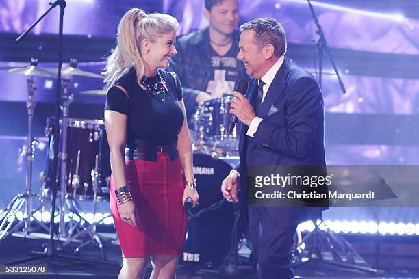 Beatrice Egli and Roland Kaiser perform on stage during the taping of the tv show 'Beatrice Egli - Die grosse Show der Traeume' on May 20, 2016 in...