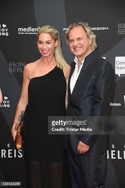 Uwe Ochsenknecht and his girlfriend Kirsten Kiki Viebrock attend the Deutscher Schauspielerpreis 2016 on May 20, 2016 in Berlin, Germany.