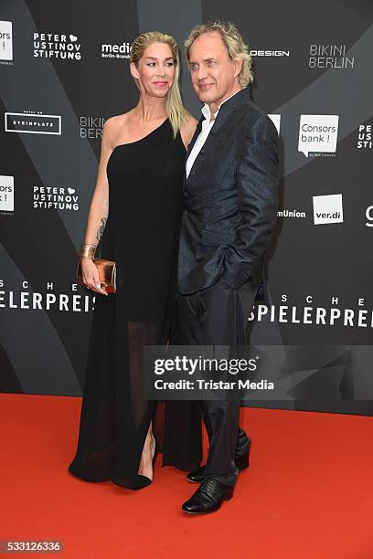 Uwe Ochsenknecht and his girlfriend Kirsten Kiki Viebrock attend the Deutscher Schauspielerpreis 2016 on May 20, 2016 in Berlin, Germany.