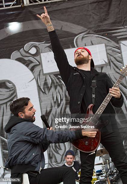 Musicians Jeremy McKinnon and Kevin Skaff of A Day To Remember performs at MAPFRE Stadium on May 20, 2016 in Columbus, Ohio.