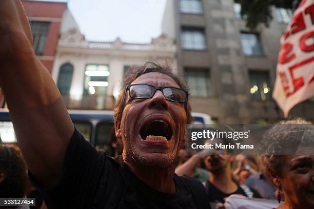 Protesters demonstrate against interim President Michel Temer on May 20, 2016 in Rio de Janeiro, Brazil. Temer assumed the position last week...