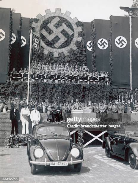 German Chancellor Adolf Hitler gives a speech after laying the foundation stone of the new Volkswagen works at Fallersleben, Germany, 27th May 1938....
