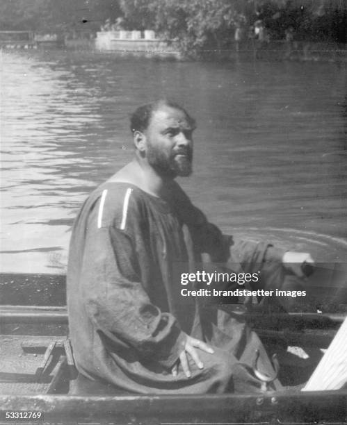 Gustav Klimt in a rowboat at the Attersee. Photography. Around 1910. [Gustav Klimt im Ruderboot auf dem Attersee. Um 1910. Photographie...