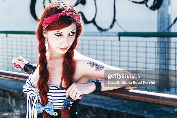 skater girl - pin up girl tattoo stock pictures, royalty-free photos & images