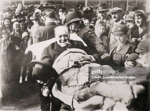 Winston Churchill , English politician, with the obligatory cigar on a stretcher after having had typhus. Photography. 1932. [Winston Churchill ,...