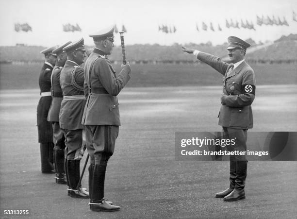 Adolf Hitler on the " Reichsparteitag" on the occasion of the "Tag der Wehrmacht". Hitler greets the commander of the "Wehrmacht" Fieldmarshal Werner...