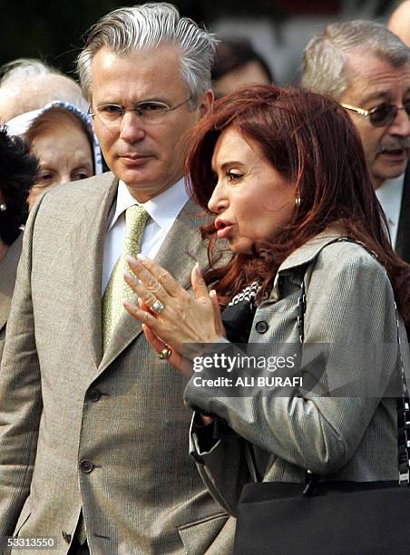 Spanish judge Baltasar Garzon , and Argentine First Lady Cristina Fernandez de Kirchner talk during a visit to the Navy's Mechanic School - the main...