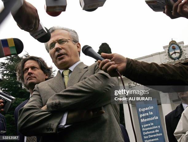 Spanish judge Baltasar Garzon and Uruguayan senator Rafael Michelini , speak with the press during a visit to the Navy's Mechanic School - the main...