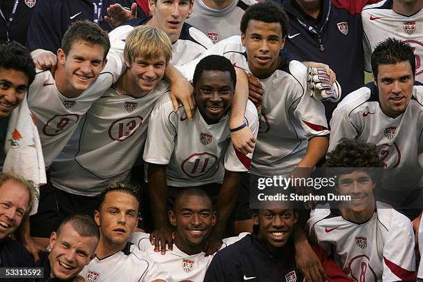 Freddy Adu of the USA poses with teammates including Chad Barrett, Jacob Peterson, Charlie Davies, Hunter Freeman and Benny Feilhaber after their...