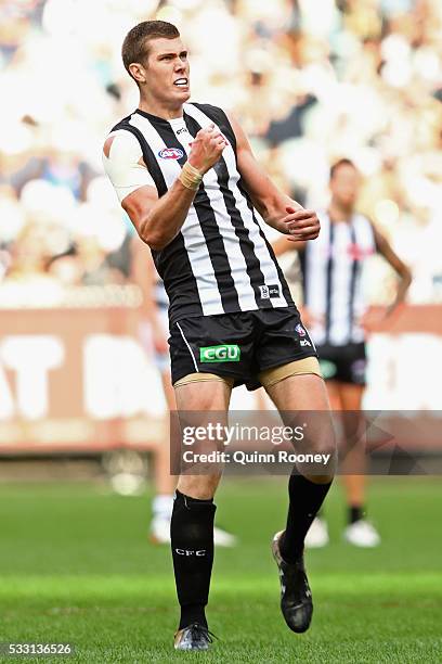 Mason Cox of the Magpies celebrates after kicking a goal during the round nine AFL match between the Collingwood Magpies and the Carlton Blues at...