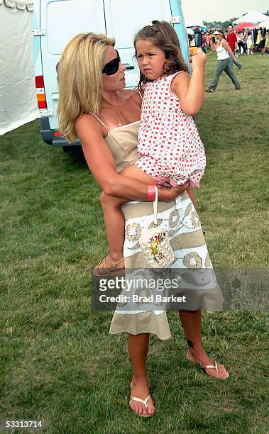 Kelly Ripa and Lola Grace Consuelos arrive at the InStyle Magazine and Donna Karan Present Super Saturday event July 30, 2005 in East Hampton, New...