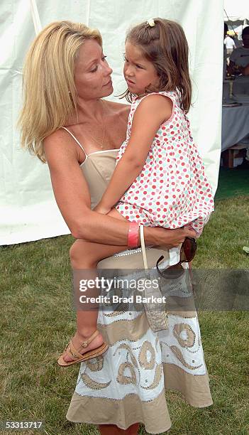 Kelly Ripa and Lola Grace Consuelos arrive at the InStyle Magazine and Donna Karan Present Super Saturday event July 30, 2005 in East Hampton, New...