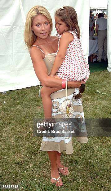 Kelly Ripa and Lola Grace Consuelos arrive at the InStyle Magazine and Donna Karan Present Super Saturday event July 30, 2005 in East Hampton, New...