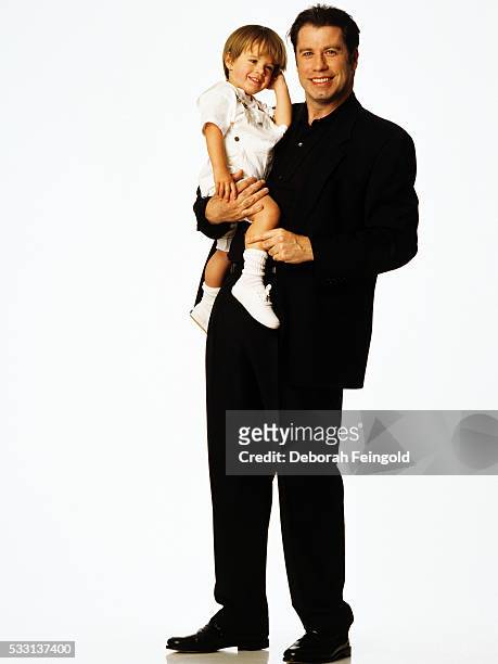 Deborah Feingold/Corbis via Getty Images) John and Jett Travolta