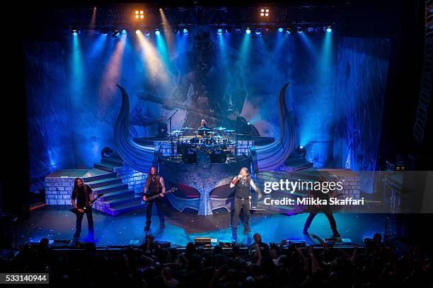 Guitarist Johan Soderberg , bassist Ted Lundstrom, drummer Jocke Wallgren, vocalist Johan Hegg and guitarist Olavi Mikkonen of Amon Amarth perform at...