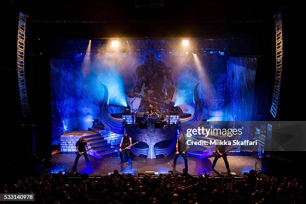 Guitarist Johan Soderberg , bassist Ted Lundstrom, drummer Jocke Wallgren, vocalist Johan Hegg and guitarist Olavi Mikkonen of Amon Amarth perform at...