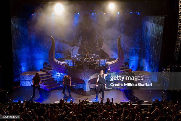 Guitarist Johan Soderberg , bassist Ted Lundstrom, drummer Jocke Wallgren, vocalist Johan Hegg and guitarist Olavi Mikkonen of Amon Amarth perform at...