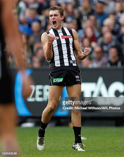 Darcy Moore of the Magpies celebrates a goal during the 2016 AFL Round 09 match between the Collingwood Magpies and the Geelong Cats at the Melbourne...