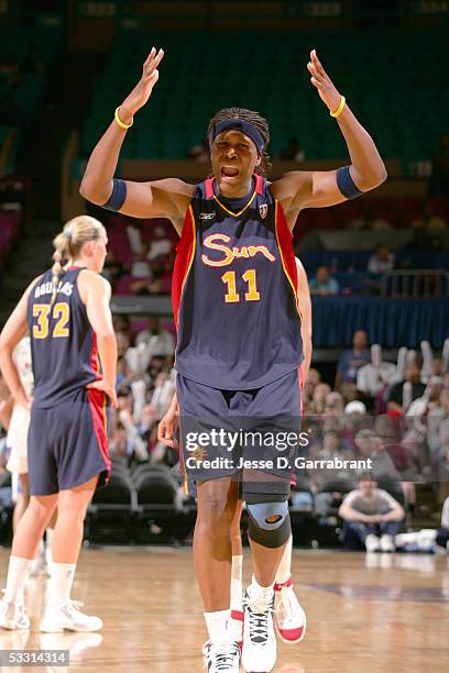 Taj McWilliams-Franklin of the Connecticut Sun celebrates against the New York Liberty July 7, 2005 at Madison Square Garden in New York, New York....