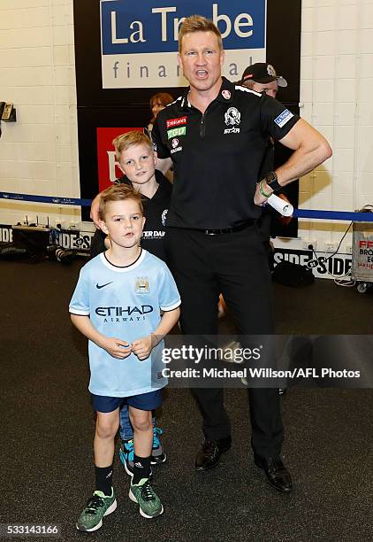 Nathan Buckley, Senior Coach of the Magpies with his children after the 2016 AFL Round 09 match between the Collingwood Magpies and the Geelong Cats...