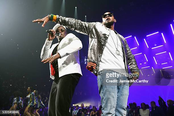 Usher and Sean "Diddy" Combs aka Puff Daddy perform onstage during the Puff Daddy and The Family Bad Boy Reunion Tour presented by Ciroc Vodka And...