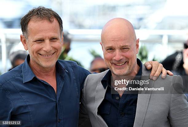 Charles Berling and Christian Berkel attend the "Elle" Photocall during the 69th annual Cannes Film Festival at the Palais des Festivals on May 21,...