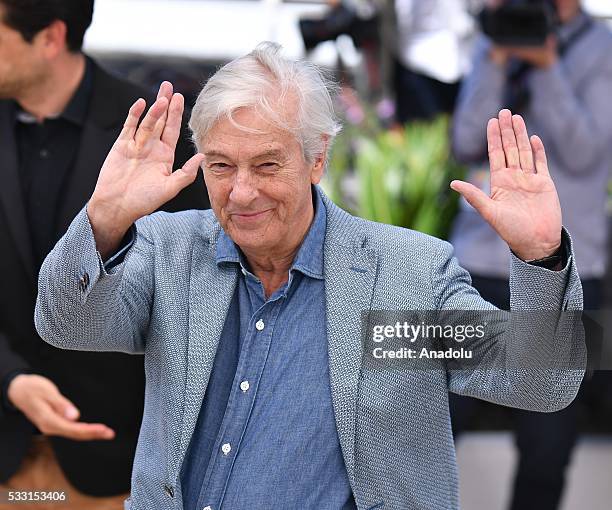 Dutch director Paul Verhoeven poses during the photocall for the film 'Elle' at the 69th international film festival in Cannes on May 21, 2016.