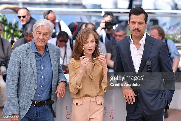 Dutch director Paul Verhoeven , French actress Isabelle Huppert and French actor Laurent Lafitte pose during the photocall for the film 'Elle' at the...