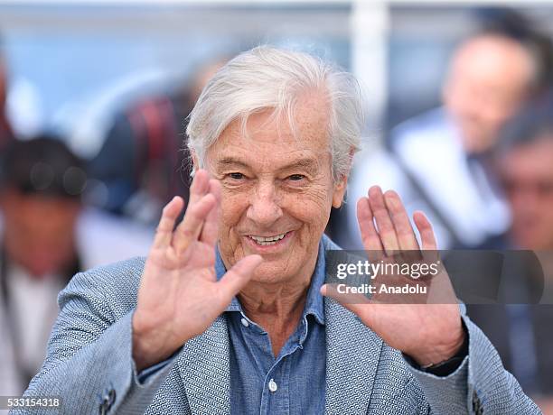 Dutch director Paul Verhoeven poses during the photocall for the film 'Elle' at the 69th international film festival in Cannes on May 21, 2016.