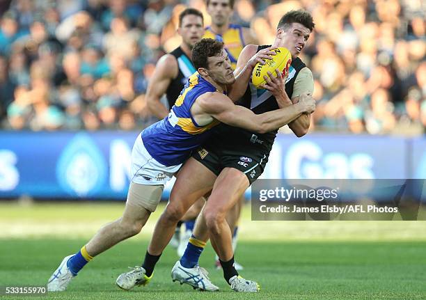 Luke Shuey of the Eagles tackles Paul Stewart of the Power during the 2016 AFL Round 09 match between Port Adelaide Power and the West Coast Eagles...