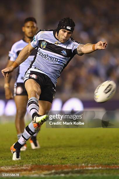 Michael Ennis of the Sharks kicks during the round 11 NRL match between the Cronulla Sharks and the Manly Sea Eagles at Southern Cross Group Stadium...