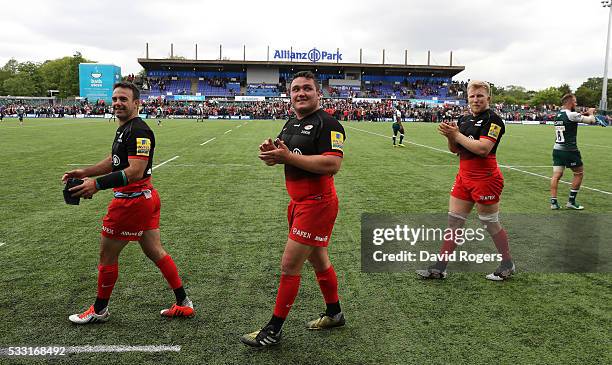 Neil de Kock, Jamie George and Jackson Wray of Saracens celebrates after their victory during the Aviva Premiership semi final match between Saracens...