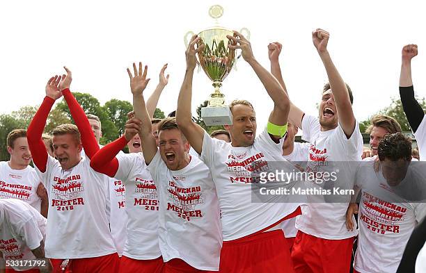 The players of Zwickau celebrate with the trophy after winning the Regionalliga Nordost championship title after the Regionalliga Nordost match...