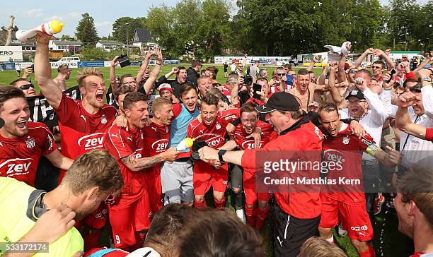 Players and Supporters of Zwickau celebrate after winning the Regionalliga Nordost championship title after the Regionalliga Nordost match between FC...